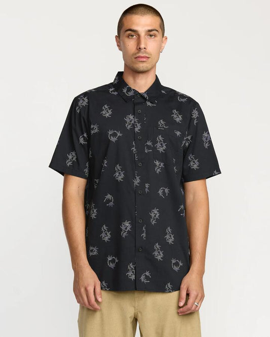 Image of a model wearing Tops. Productname: Volcom - Mens Scaller Stone Woves Short Sleeve Shirt - Antique Black - in Antique Black colour by brand - Volcom