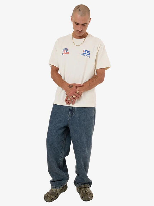 Image of a model wearing Tops. Productname: Worship Logistics Tee in Zine colour by brand - Worship