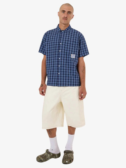 Image of a model wearing Tops. Productname: Worship Removal Ss Shirt in Bell Air Blue colour by brand - Worship