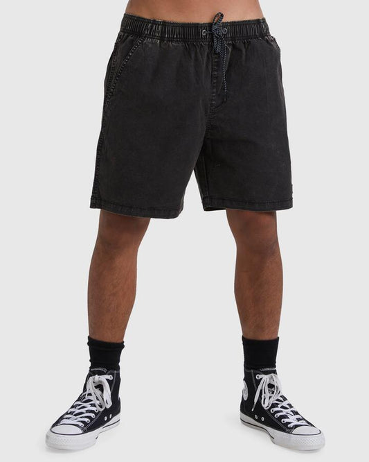 Image of a model wearing Shorts. Productname: Billabong Mens Mario 2.0 17" Shorts Black - in Black colour by brand - Billabong