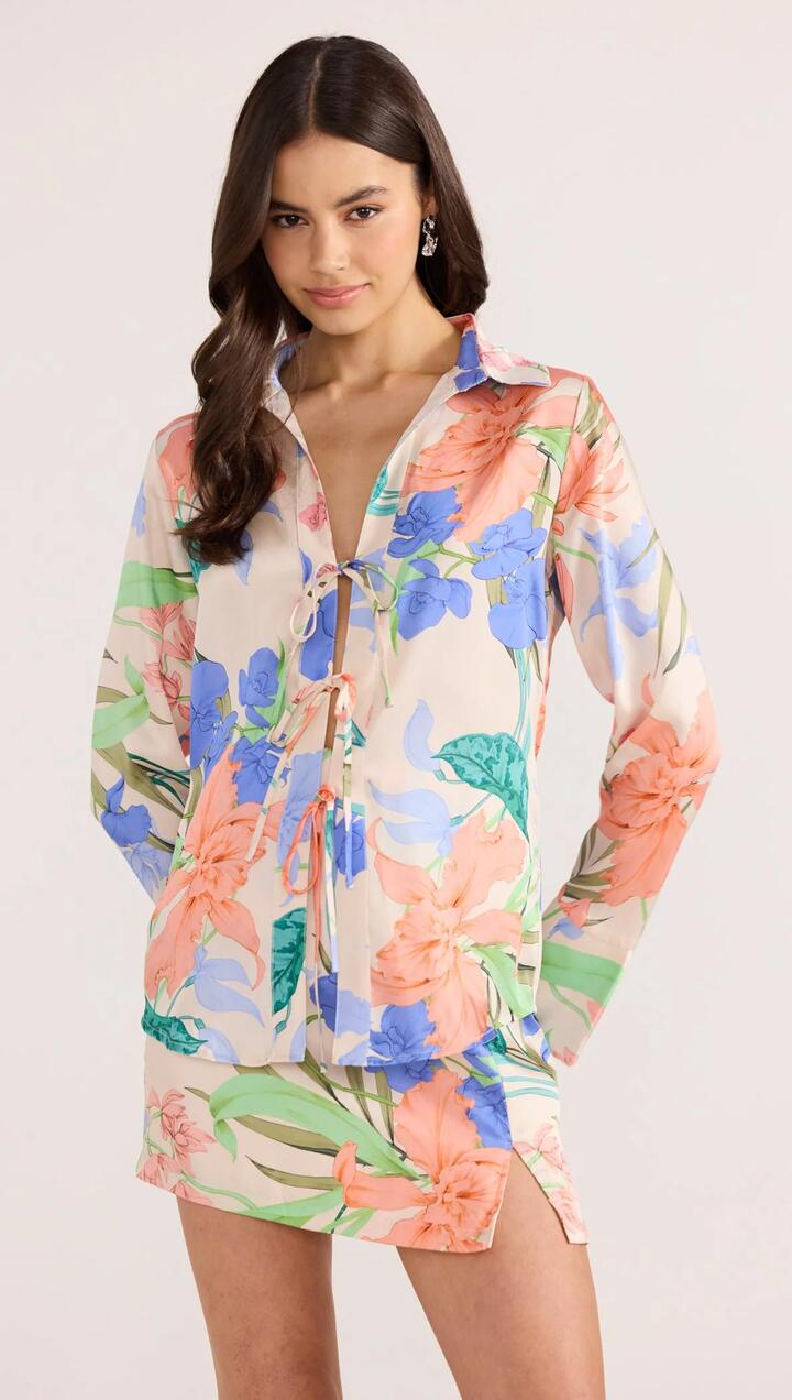Image of a model wearing Tops. Product name - Ravina Tie Shirt in Floral colour by brand - MINKPINK