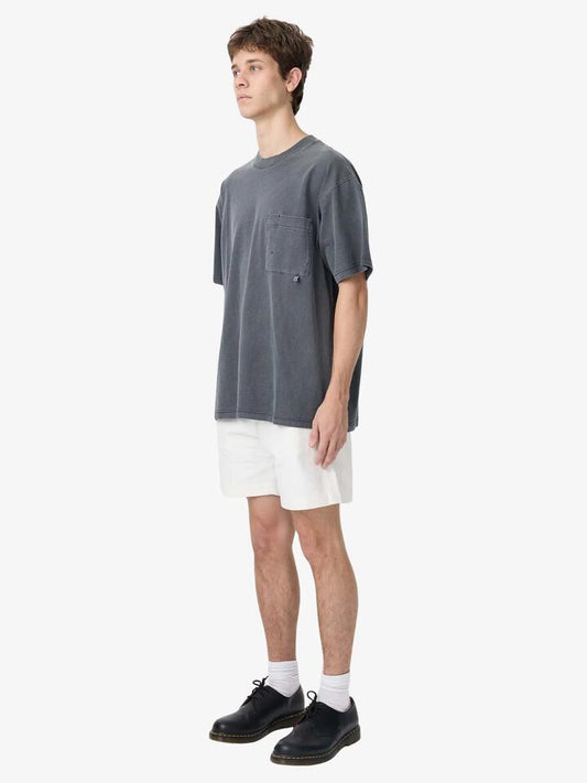 Image of a model wearing Tops. Productname: Article One Sayo Pocket Tee in Slate colour by brand - Article One