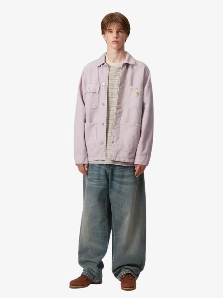 Image of a model wearing Pants. Productname: Carhartt Wip Brandon Pants in Blue Worn Used Denim colour by brand - Carhartt Wip
