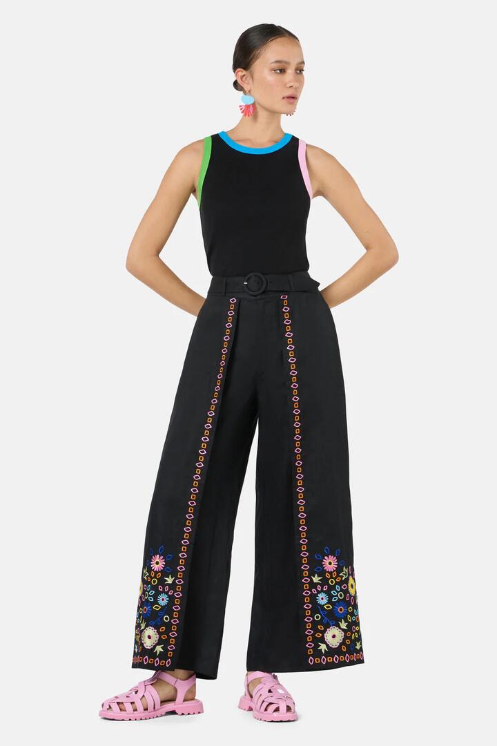 Image of a model wearing Pants. Productname: Tropic Pop Embroidered Pant in Black colour by brand - Gorman