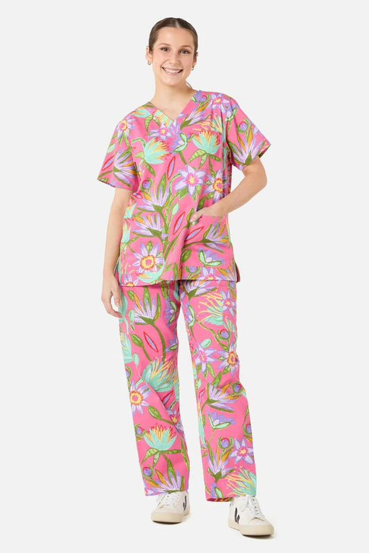 Image of a model wearing Uniforms & Workwear. Product name - Lotus Flower scrub set in Pink colour by brand - Gorman