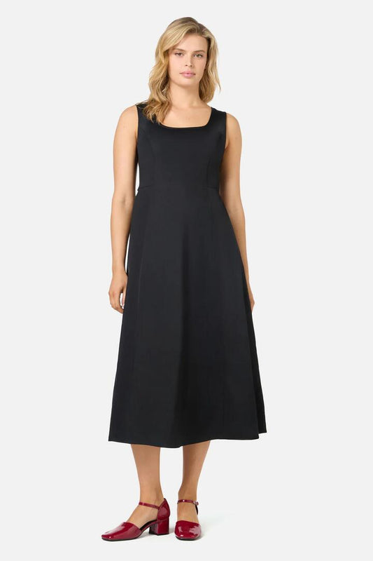 Image of a model wearing Dress. Productname: Delphine Classic Midi Dress in Black colour by brand - Princess Highway