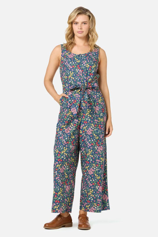 Image of a model wearing Outerwear. Productname: Libby Bee Ditsy Jumpsuit in Blue colour by brand - Princess Highway