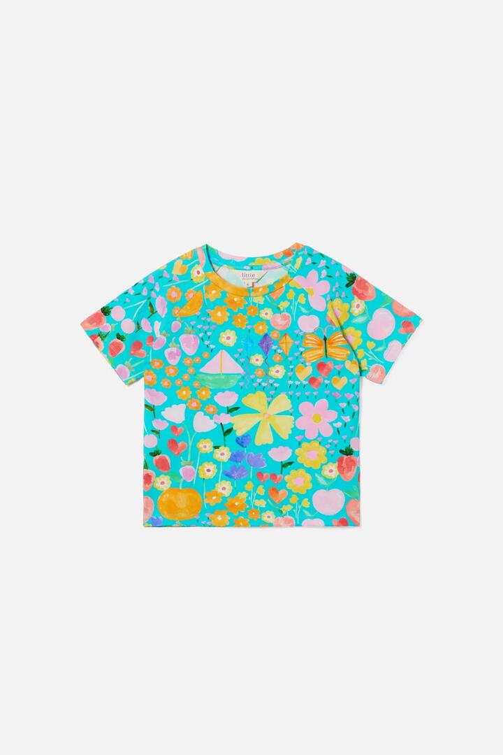 Image of a model wearing Tops. Product name - Pretty Things Kids Short Sleeve Tee in Green colour by brand - Princess Highway Kids