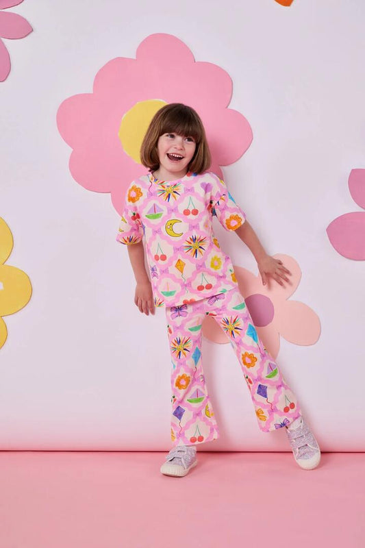 Image of a model wearing Pants. Product name - Collections Kids Legging in Pink colour by brand - Princess Highway Kids