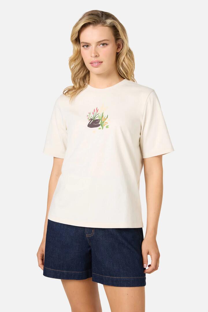 Image of a model wearing Tops. Productname: Pretty Swan Tee in Cream colour by brand - Princess Highway