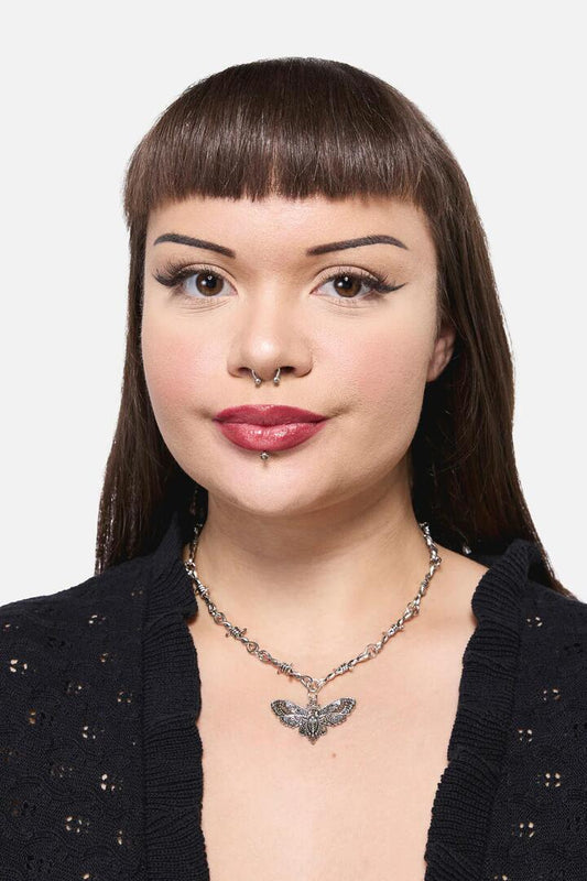 Image of Necklaces. Productname: Barbed Wire Moth Necklace in Silver colour by brand - Dangerfield