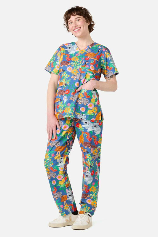 Image of a model wearing Uniforms & Workwear. Productname: Bush Tapestry Scrub Set in Blue colour by brand - Scrubs With Love