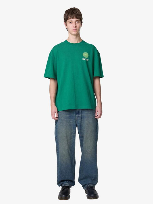 Image of a model wearing Tops. Productname: Deus Strata Tee in Green colour by brand - Deus
