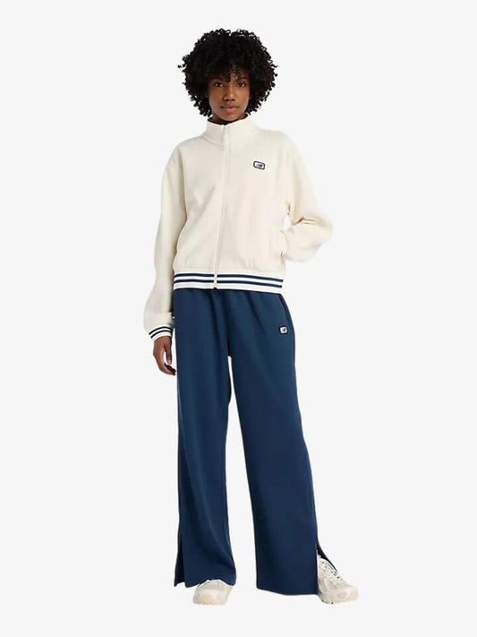 Image of a model wearing Outerwear. Productname: New Balance Post Season Pique Track Jacket in Permafrost colour by brand - New Balance