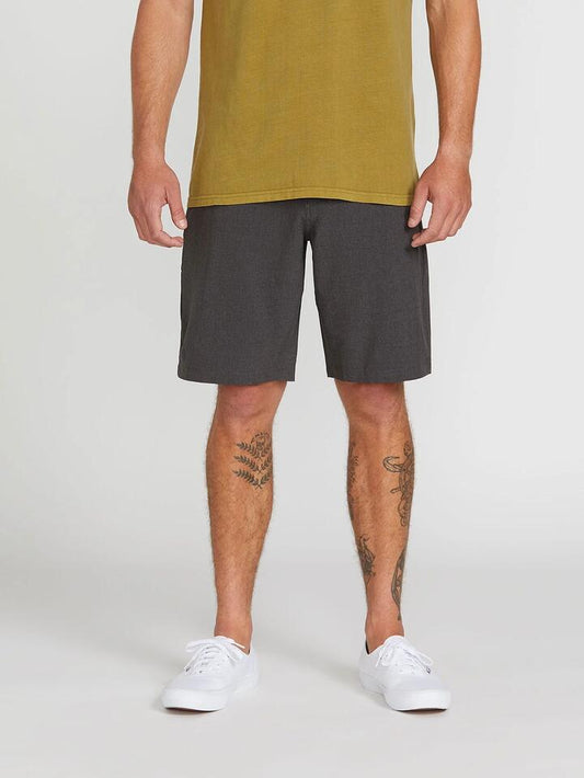 Image of a model wearing Shorts. Productname: Volcom Mens Kerosene Hybrid Shorts Charcoal Heather - in Charcoal Heather colour by brand - Volcom