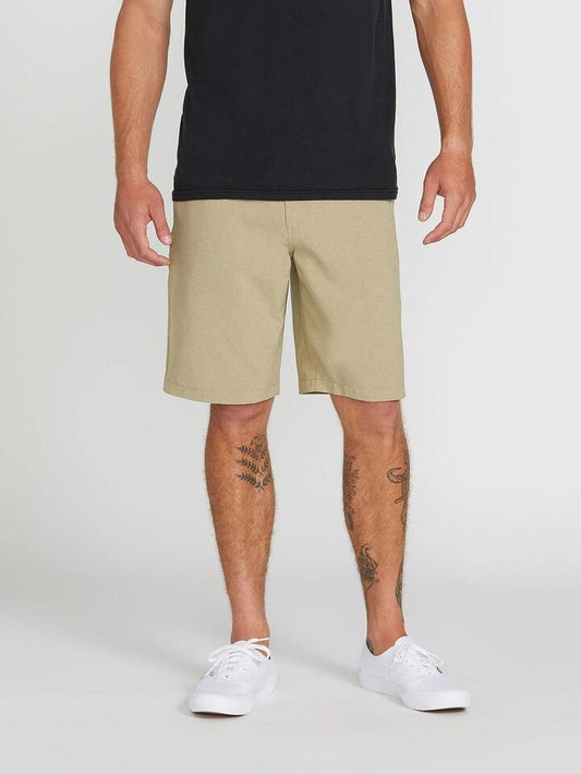 Image of a model wearing Shorts. Productname: Volcom Mens Kerosene Hybrid Shorts Khaki - in Khaki colour by brand - Volcom