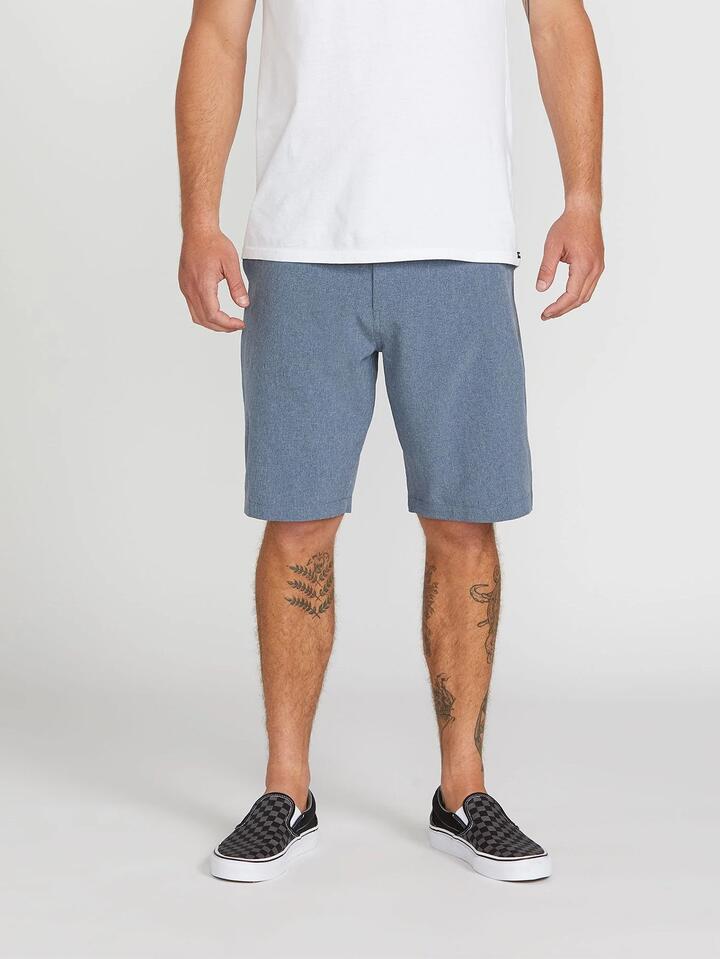 Image of a model wearing Shorts. Product name - Volcom Mens Kerosene Hybrid Shorts Navy in Navy colour by brand - Volcom