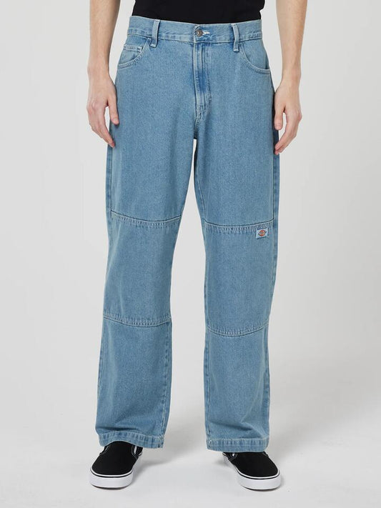 Image of a model wearing Denim. Productname: Dickies Denim Double Knee Pants in Light Wash colour by brand - Dickies