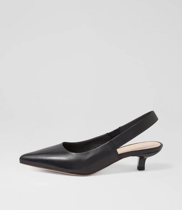 Image of a model wearing Dress. Productname: Canzes Mo Black Leather Black in BLACK colour by brand - MOLLINI