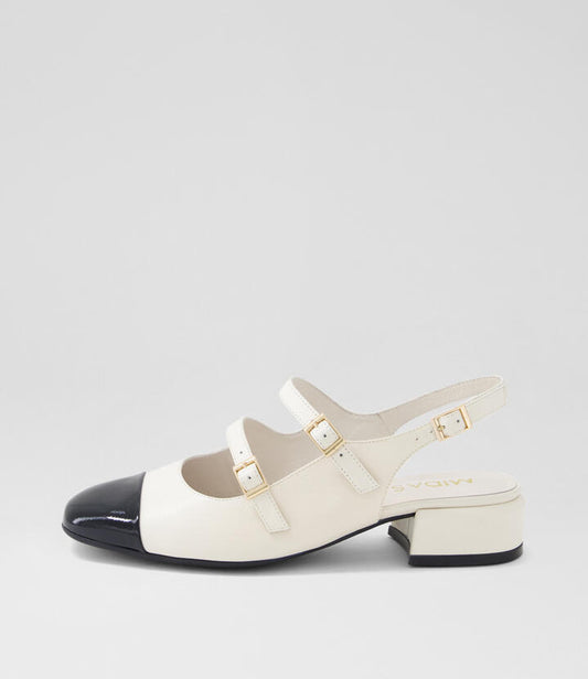 Image of Heels. Productname: Velo Black Ivory Patent Leather Heels in BLACK-IVORY colour by brand - MIDAS