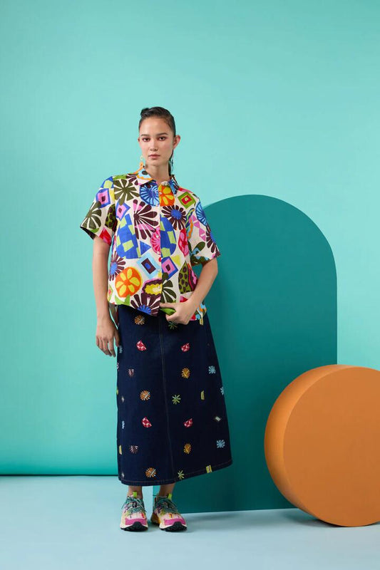 Image of a model wearing Denim. Productname: Tropic Pop Denim Skirt in Indigo colour by brand - Gorman