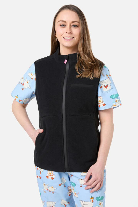 Image of a model wearing Outerwear. Productname: Black Polar Fleece Scrub Vest in Black colour by brand - Scrubs With Love