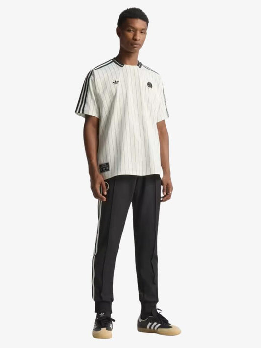 Image of a model wearing Tops. Productname: Adidas Newcastle United FC Icon Jersey in Off White colour by brand - Adidas