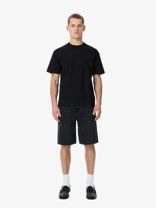 Image of a model wearing Tops. Productname: Article One Heavyweight Tee in Black colour by brand - Article One