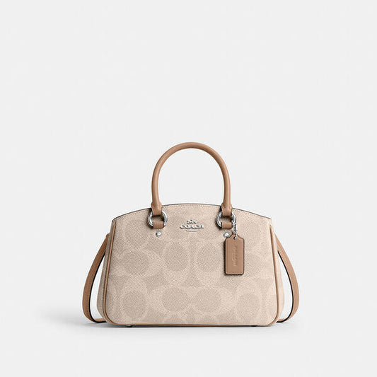 Image of Bags. Productname: Savannah Small Carryall Bag In Signature Canvas in SV/SAND/TAUPE colour by brand - Coach Outlet Australia