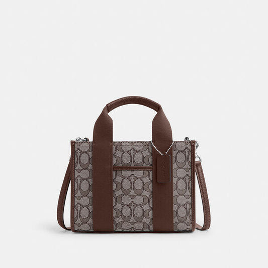 Image of Bags. Productname: Smith Tote Bag 24 In Signature Jacquard in SV/OAK/MAPLE colour by brand - Coach Outlet Australia