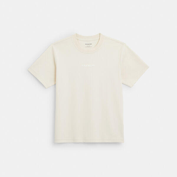 Image of a model wearing Tops. Productname: Coach Top in CREAM colour by brand - Coach Outlet Australia