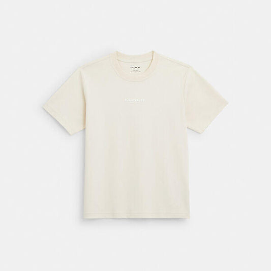 Image of a model wearing Tops. Productname: Coach Top in CREAM colour by brand - Coach Outlet Australia