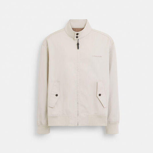 Image of a model wearing Outerwear. Productname: Harrington Jacket in STONE colour by brand - Coach Outlet Australia