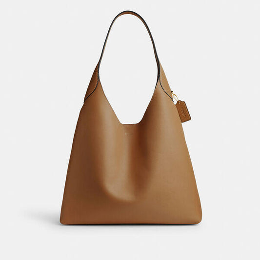 Image of Bags. Productname: Brooklyn Shoulder Bag 39 in B4/HONEY BROWN colour by brand - Coach Outlet Australia