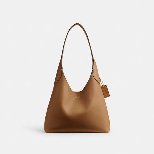 Image of Bags. Productname: Brooklyn Shoulder Bag 28 in B4/HONEY BROWN colour by brand - Coach Outlet Australia