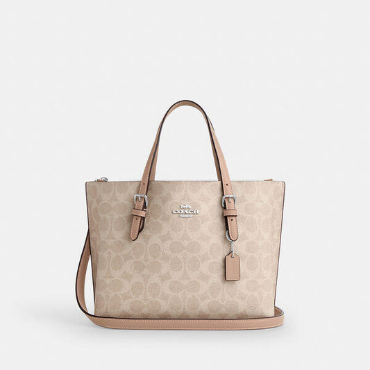 Image of Bags. Productname: Mollie Tote Bag 25 In Signature Canvas in SV/SAND/TAUPE colour by brand - Coach Outlet Australia