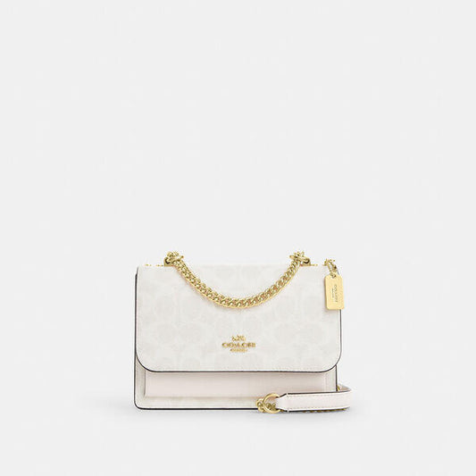 Image of Bags. Productname: Mini Klare Crossbody Bag In Signature Canvas in IM/WHITE/CHALK colour by brand - Coach Outlet Australia