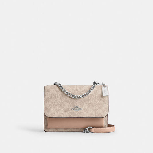 Image of Bags. Productname: Mini Klare Crossbody Bag In Signature Canvas in SV/SAND/TAUPE colour by brand - Coach Outlet Australia