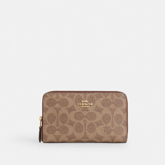 Image of Wallets & Money Clips. Productname: Medium Id Zip Wallet In Signature Canvas in IM/TAN/BROWN colour by brand - Coach Outlet Australia