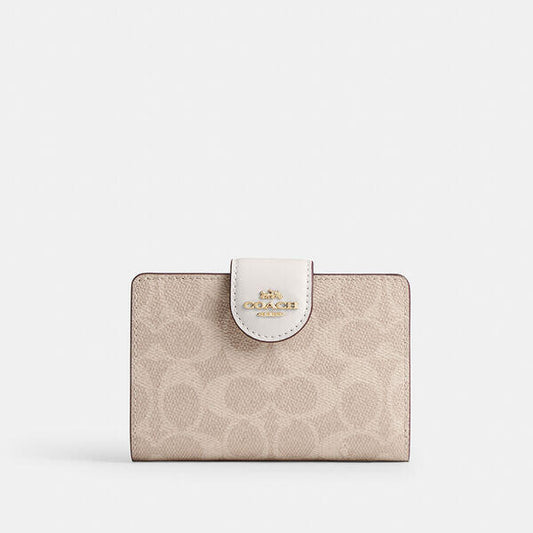Image of Wallets & Money Clips. Productname: Medium Corner Zip Wallet In Signature Canvas in IM/SAND/CHALK colour by brand - Coach Outlet Australia