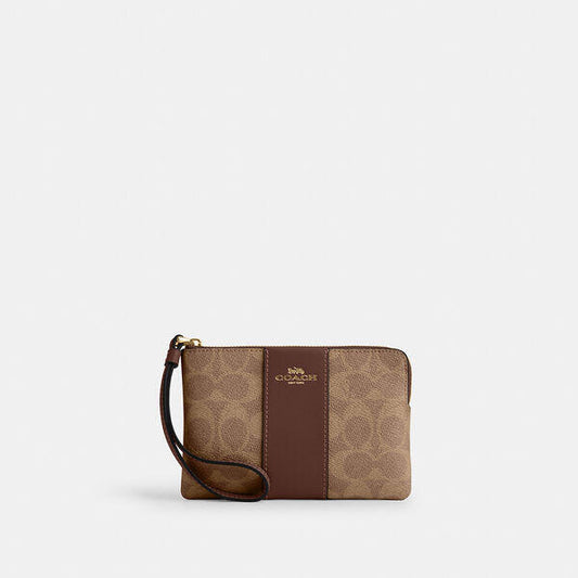 Image of Accessories. Productname: Corner Zip Wristlet In Signature Canvas With Stripe in IM/TAN/BROWN colour by brand - Coach Outlet Australia