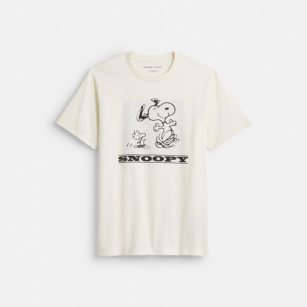 Image of a model wearing Tops. Productname: Coach X Peanuts Snoopy Signature Square T-Shirt In Organic Cotton in CHALK colour by brand - Coach Outlet Australia