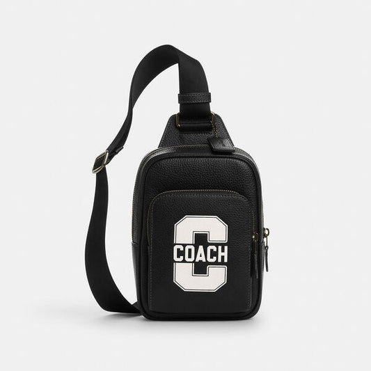 Image of Accessories. Productname: Racer Sling Pack With Varsity Motif in BLACK/CHALK colour by brand - Coach Outlet Australia