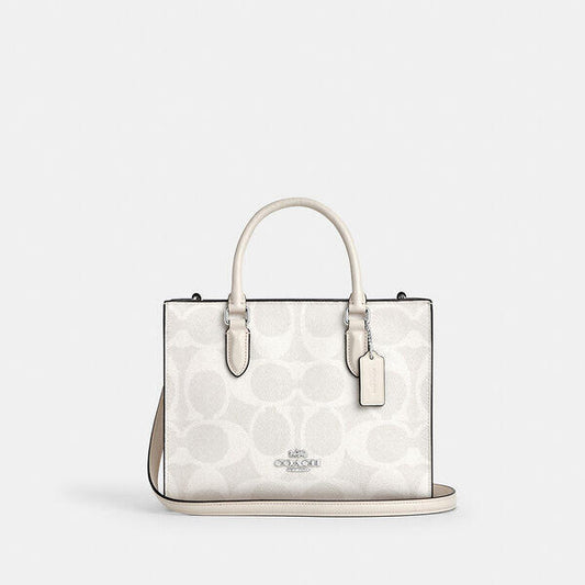 Image of Bags. Productname: Maggie Small Tote Bag In Signature Canvas in WHITE/CHALK colour by brand - Coach Outlet Australia