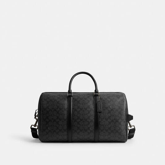 Image of Bags. Productname: Venturer Bag In Signature Canvas in QB/CHARCOAL/BLACK colour by brand - Coach Outlet Australia