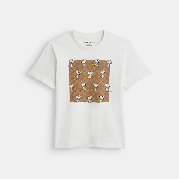 Image of a model wearing Tops. Productname: Coach X Peanuts Snoopy Signature Square T-Shirt In Organic Cotton in WHITE colour by brand - Coach Outlet Australia