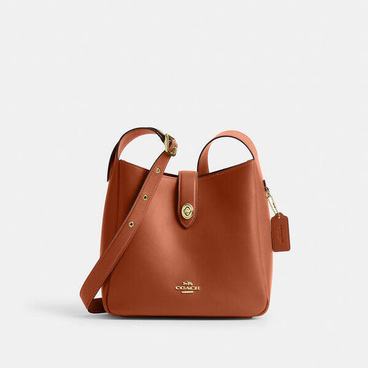 Image of Bags. Productname: Hadley Convertible Crossbody in IM/TAN colour by brand - Coach Outlet Australia