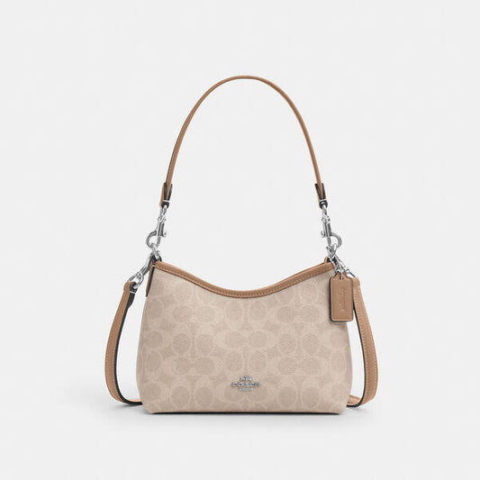 Image of Bags. Productname: Laurel Small Shoulder Bag In Signature Canvas in SV/SAND/TAUPE colour by brand - Coach Outlet Australia