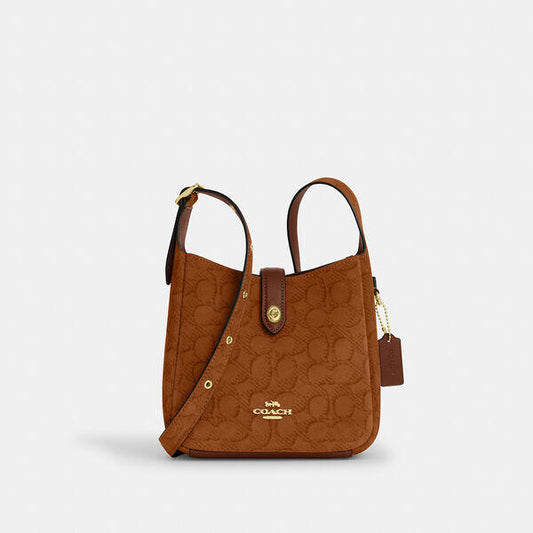 Image of Bags. Productname: Hadley Mini Crossbody Bag In Signature Suede in IM/CARAMEL colour by brand - Coach Outlet Australia