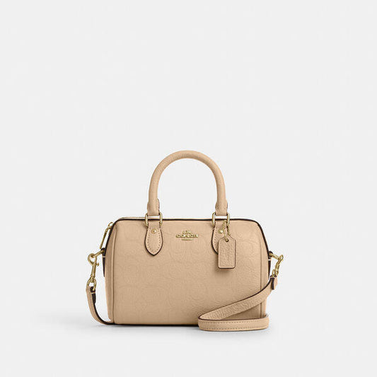 Image of Bags. Productname: Mini Rowan Crossbody Bag In Signature Leather in IMOAT colour by brand - Coach Outlet Australia